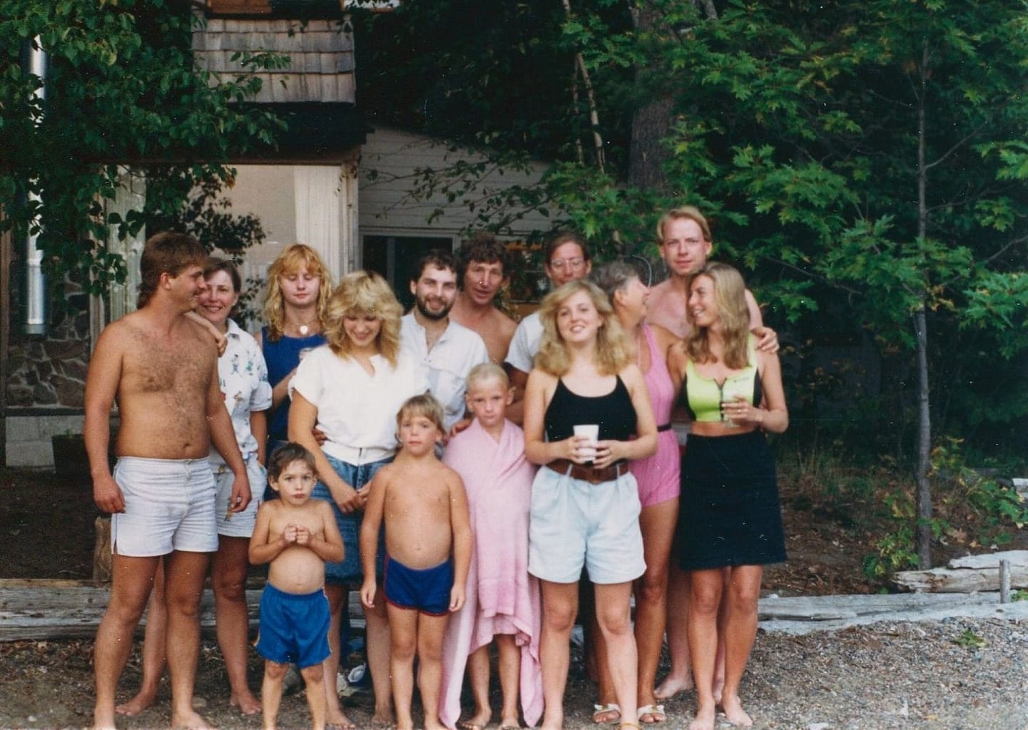 A group of people in swimwear posing for a photo.