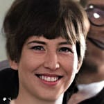 Portrait of a young lady smiling.