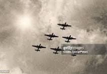 A number of war II planes in flight